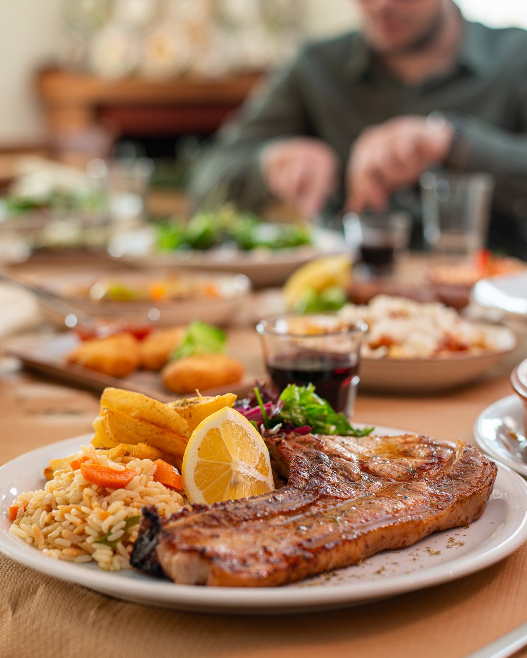 _FRG8258 Grilled meat and side dishes at Yiarenis